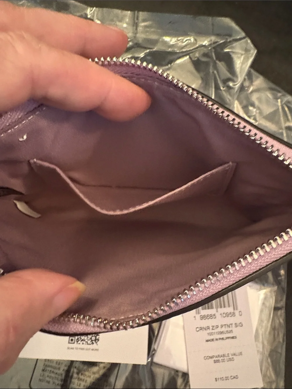 COACH Light Lilac Embossed Signature Wristlet